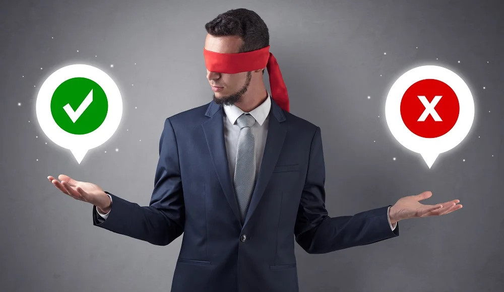 blindfolded businessman with checked and x mark ab 2026 01 09 14 58 00 utc