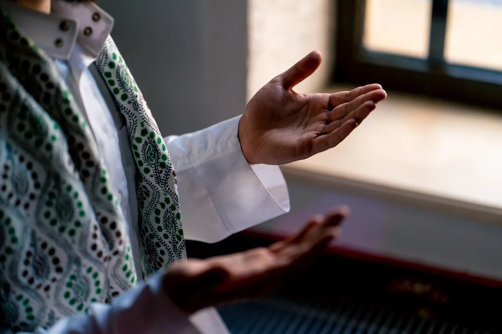 close up shot of a muslim man s hands praying on h 2026 01 06 08 49 19 utc