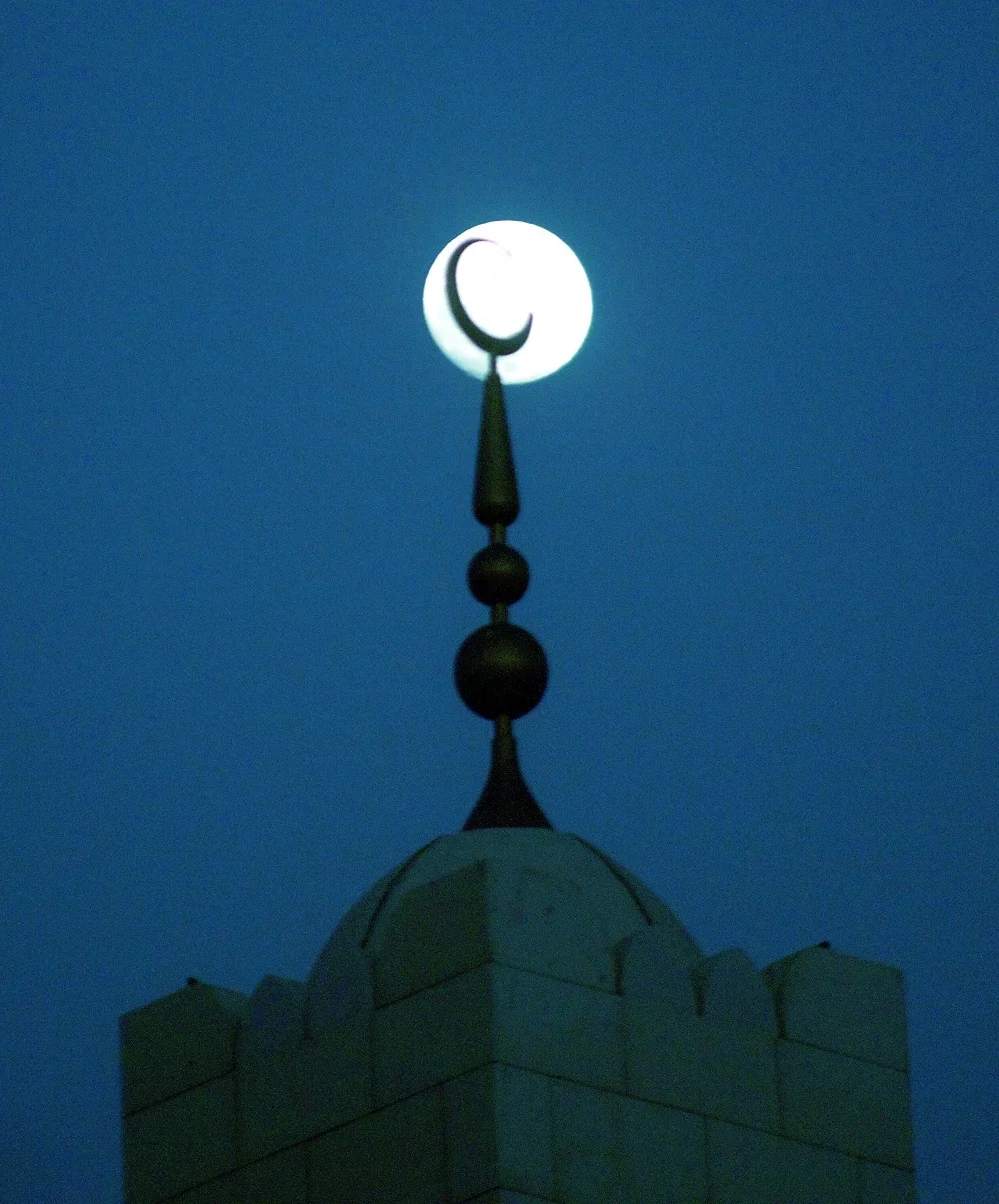 mosque minaret in dark night moonlight 2026 01 08 07 45 29 utc