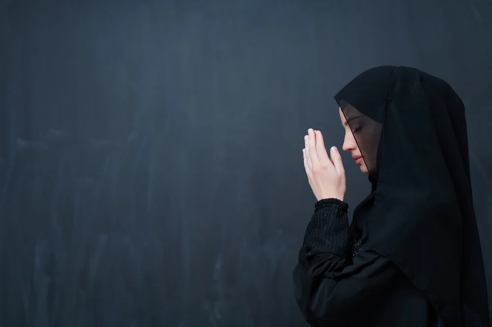 portrait of young muslim woman making dua 2026 01 11 11 12 02 utc
