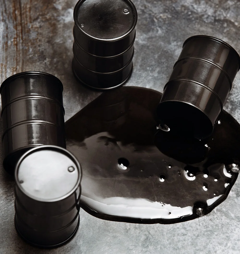 high angle view on four fuel drums with spilled oi 2026 01 07 01 24 59 utc