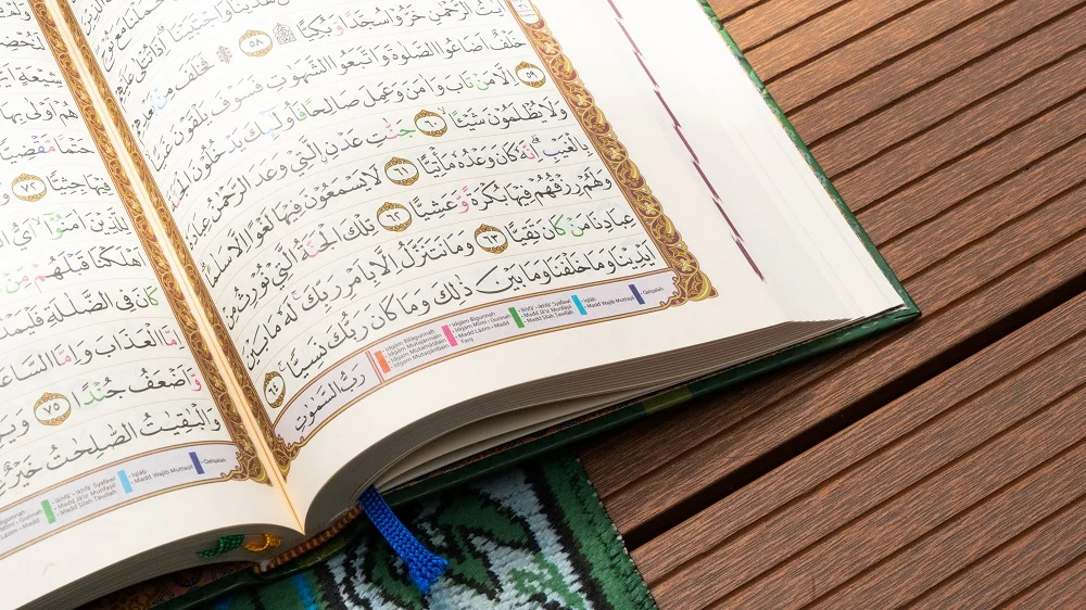 holy book al quran that open with prayer mat 2026 01 09 11 39 25 utc