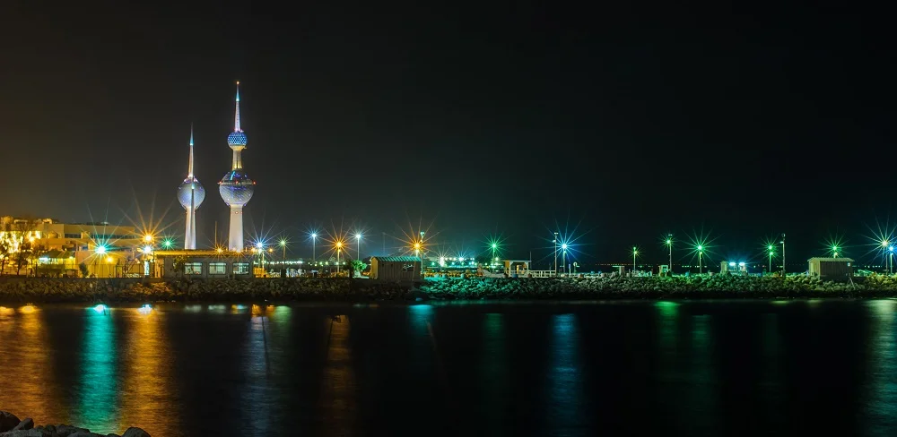 illuminated night view of kuwait city and famous t 2026 01 07 06 34 14 utc