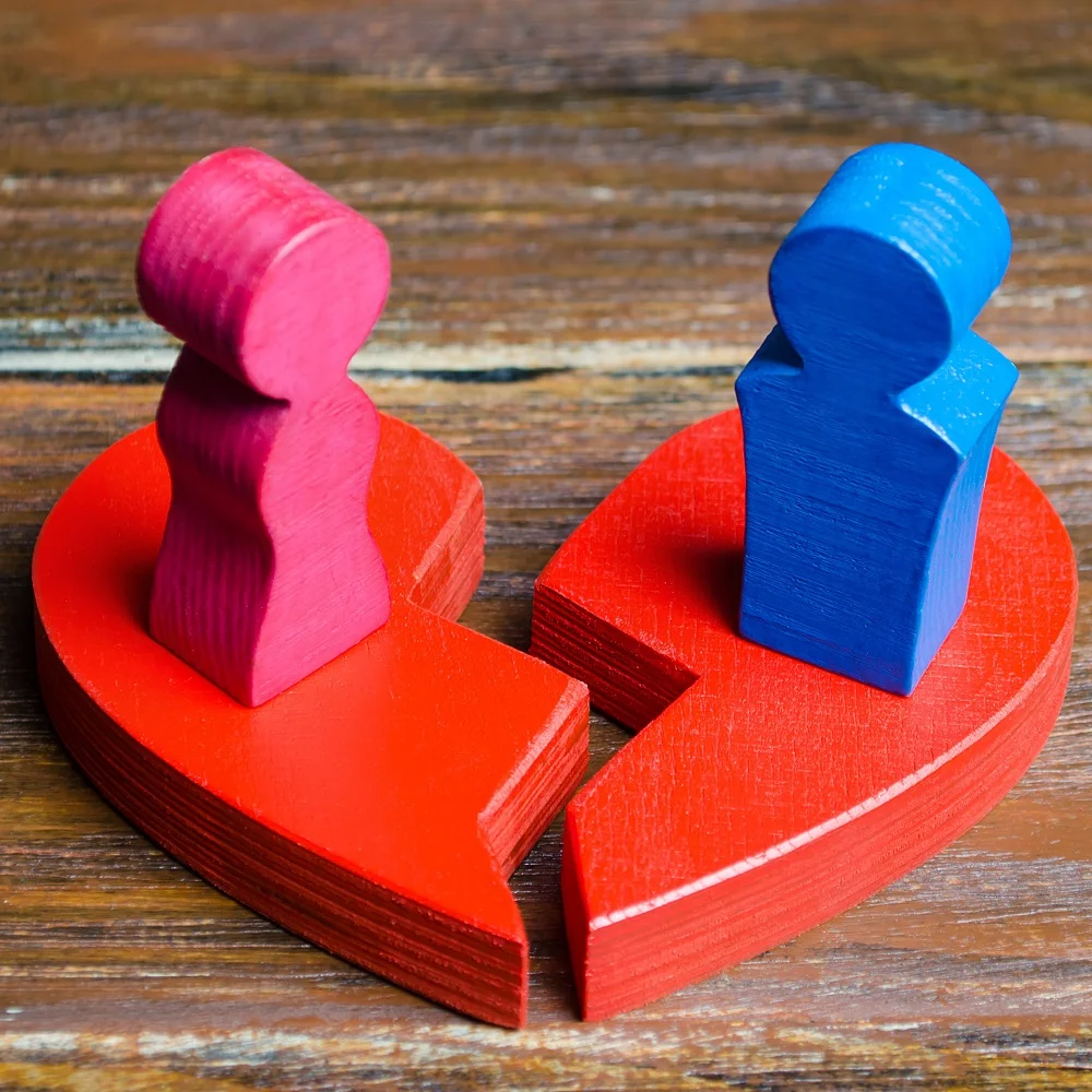 a red broken heart with a couple in lovers 2026 03 24 02 59 14 utc