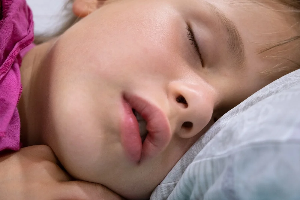 close up of a face of pretty little child girl wit 2026 03 17 07 16 54 utc