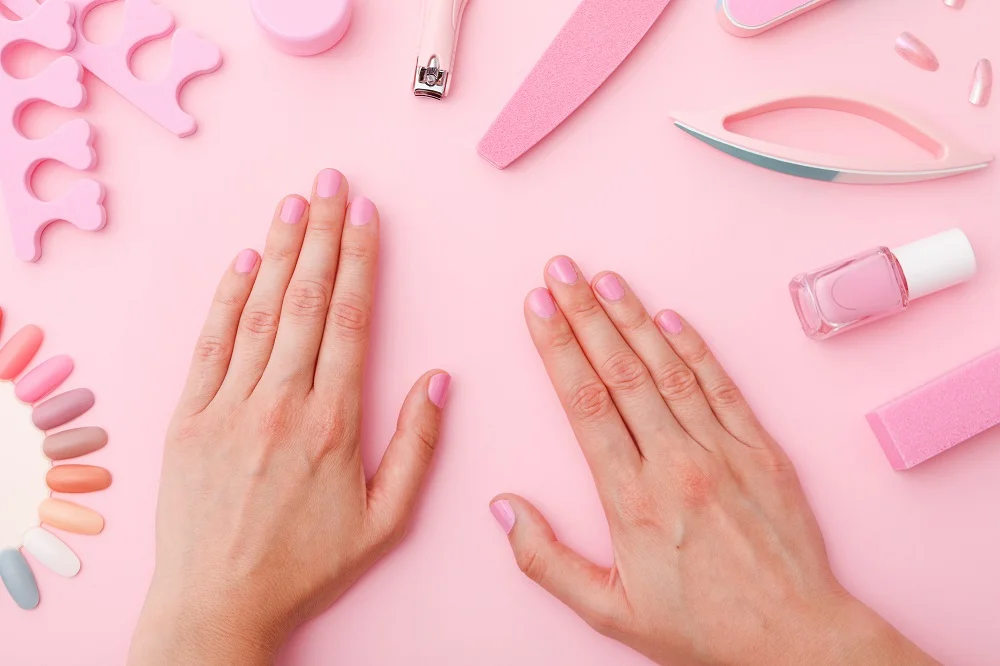 female hands with manicure on pink background top 2026 03 24 21 34 43 utc