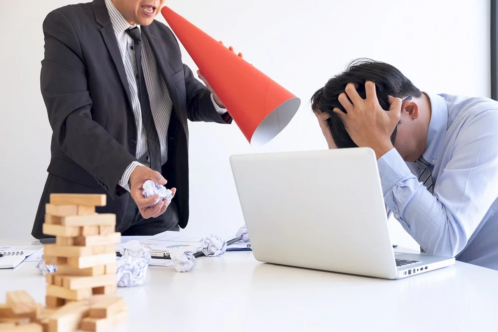 frustrated businessman shouting at colleague in of 2026 03 26 04 46 57 utc
