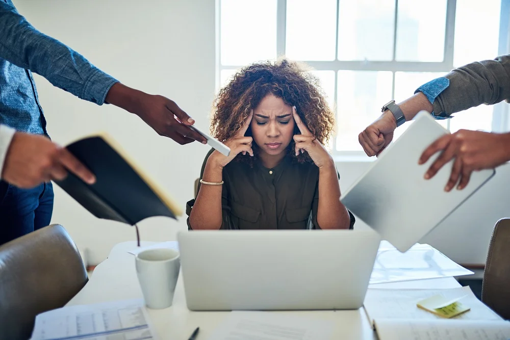stressed woman with overwhelming workload in offic 2026 03 25 06 12 21 utc