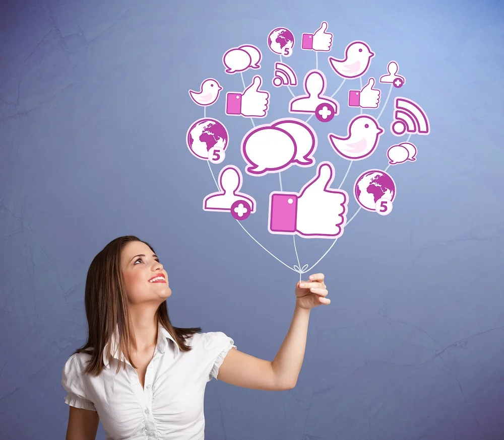 young woman holds social media icons on strings 2026 04 14 00 22 21 utc